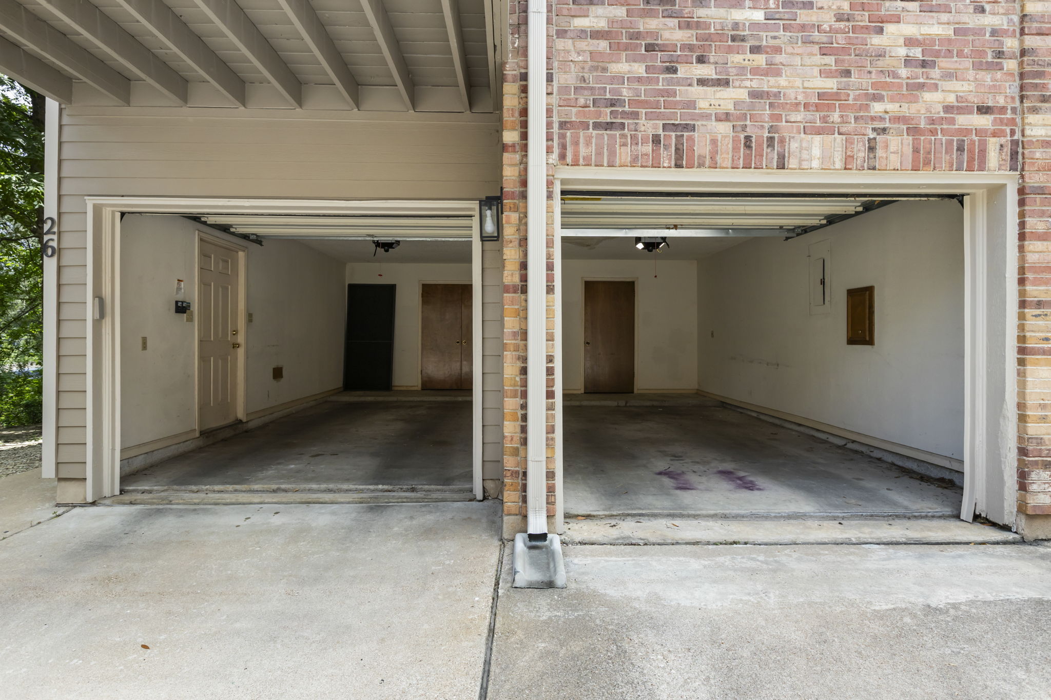 3845 Ranch Road 2222, Unit 26/M2 Austin, TX 78731 - Photo 14 of 21 2-car attached garage with storage