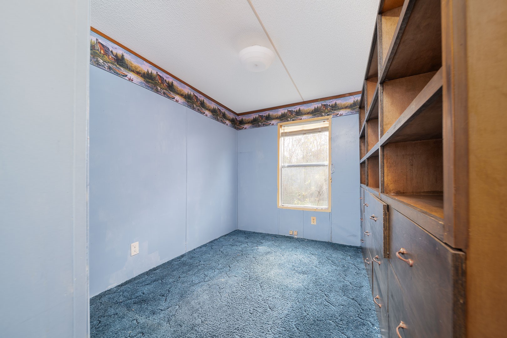 4603 Crosby Cedar Bayou Road Baytown, TX 77521 - Photo 13 of 14 a view of empty room with window and fireplace