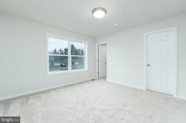 an empty room with a natural light