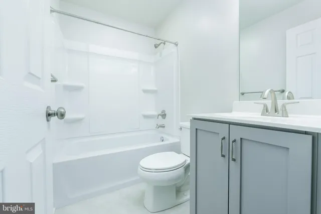 a view of a room with rack on the wall