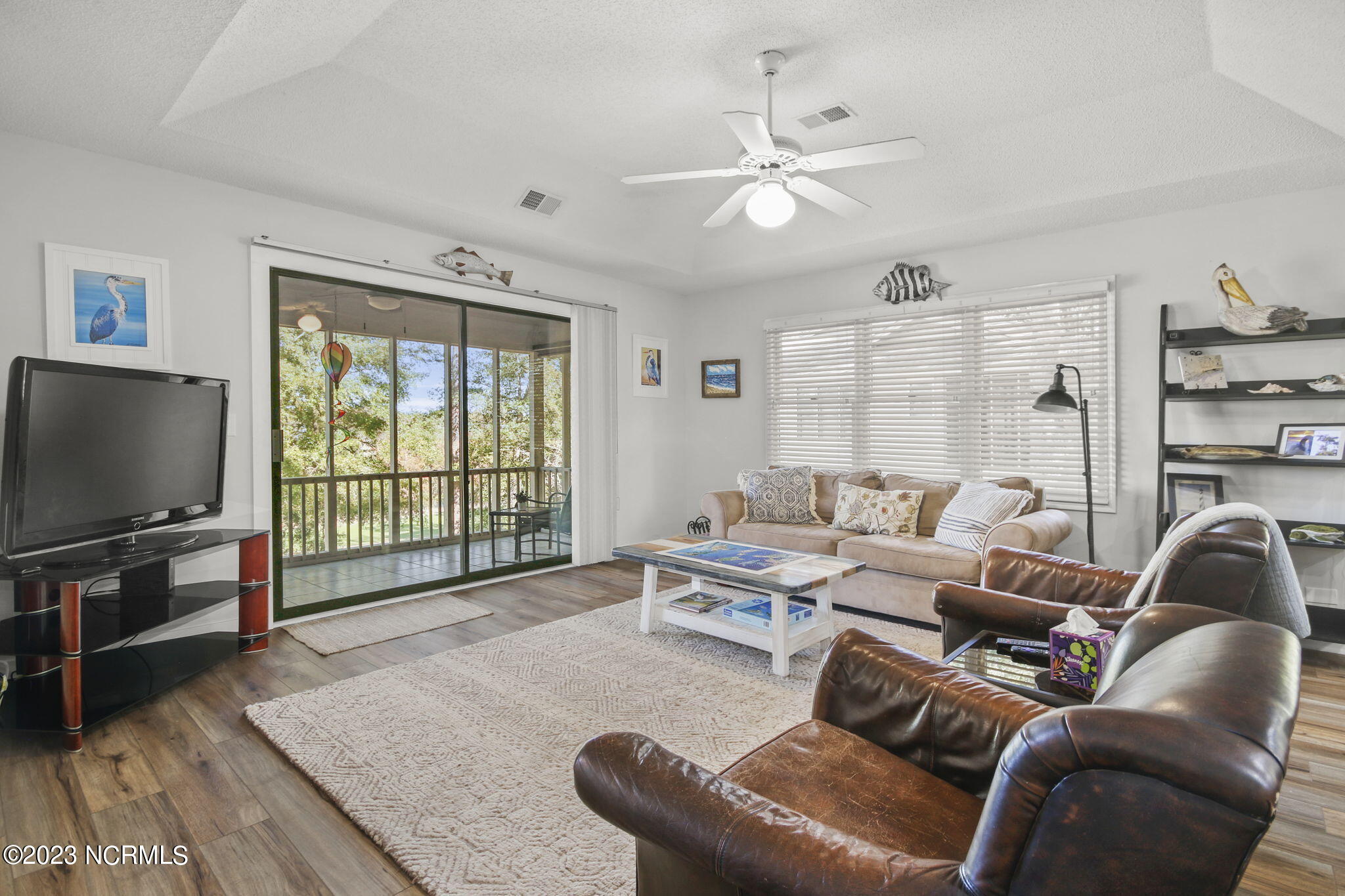 225 Clubhouse Road, Unit 706 Sunset Beach, NC 28468 - Photo 3 of 37 Enjoy the gorgeous view of the golf course right from your living room couch!
