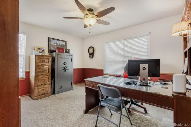 a view of a workspace with furniture