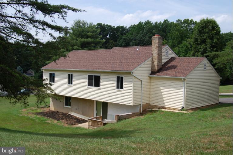 14300 Morton Hall Road Silver Spring, MD 20906 - Photo 2 of 18 a view of a house with a backyard
