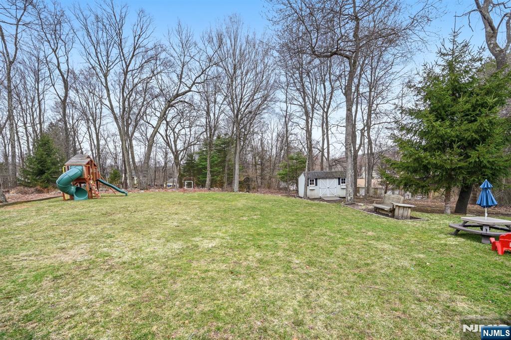 6 Robin Drive Oak Ridge, NJ 07438 - Photo 47 of 49 a view of a park with swings and slides