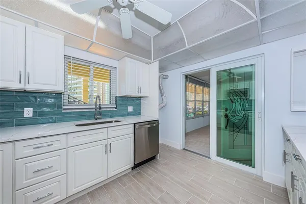a dining room with a table and chairs