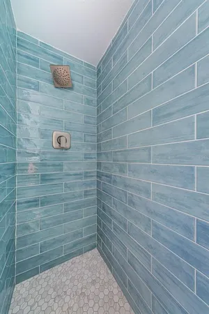 an aerial view of a house with outdoor space