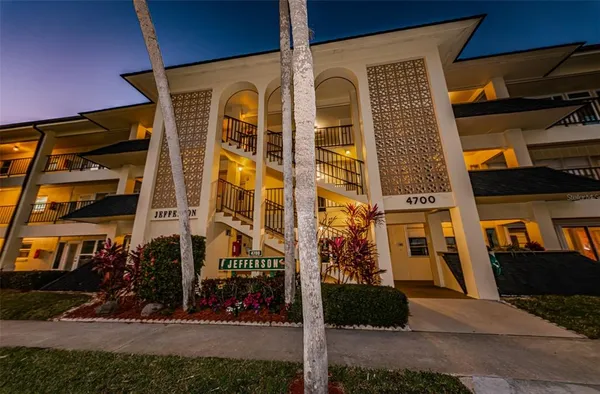 a front view of a building with street view