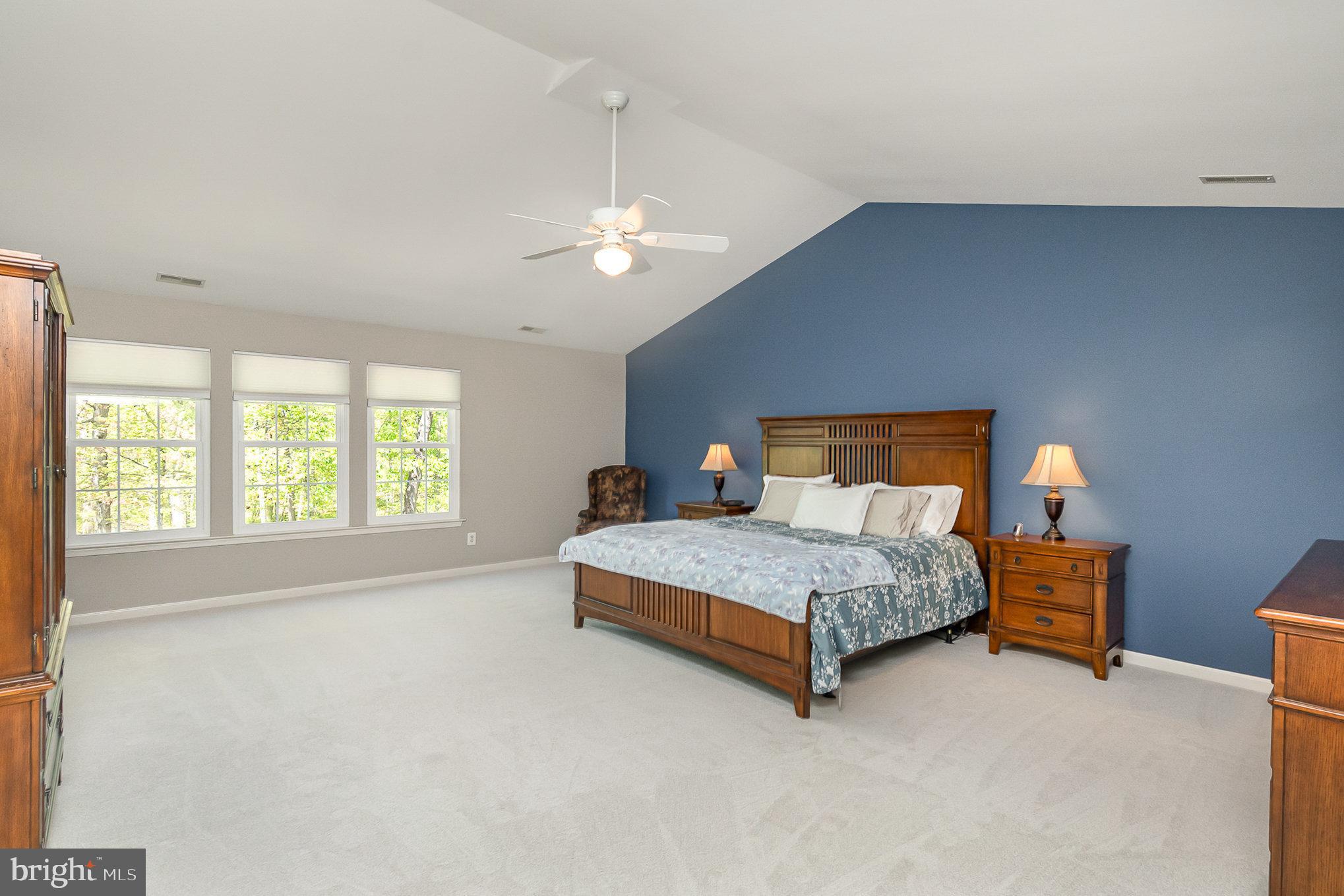 1326 Eagle Ridge Run Bel Air, MD 21014 - Photo 26 of 79 a bedroom with a bed lamp and window