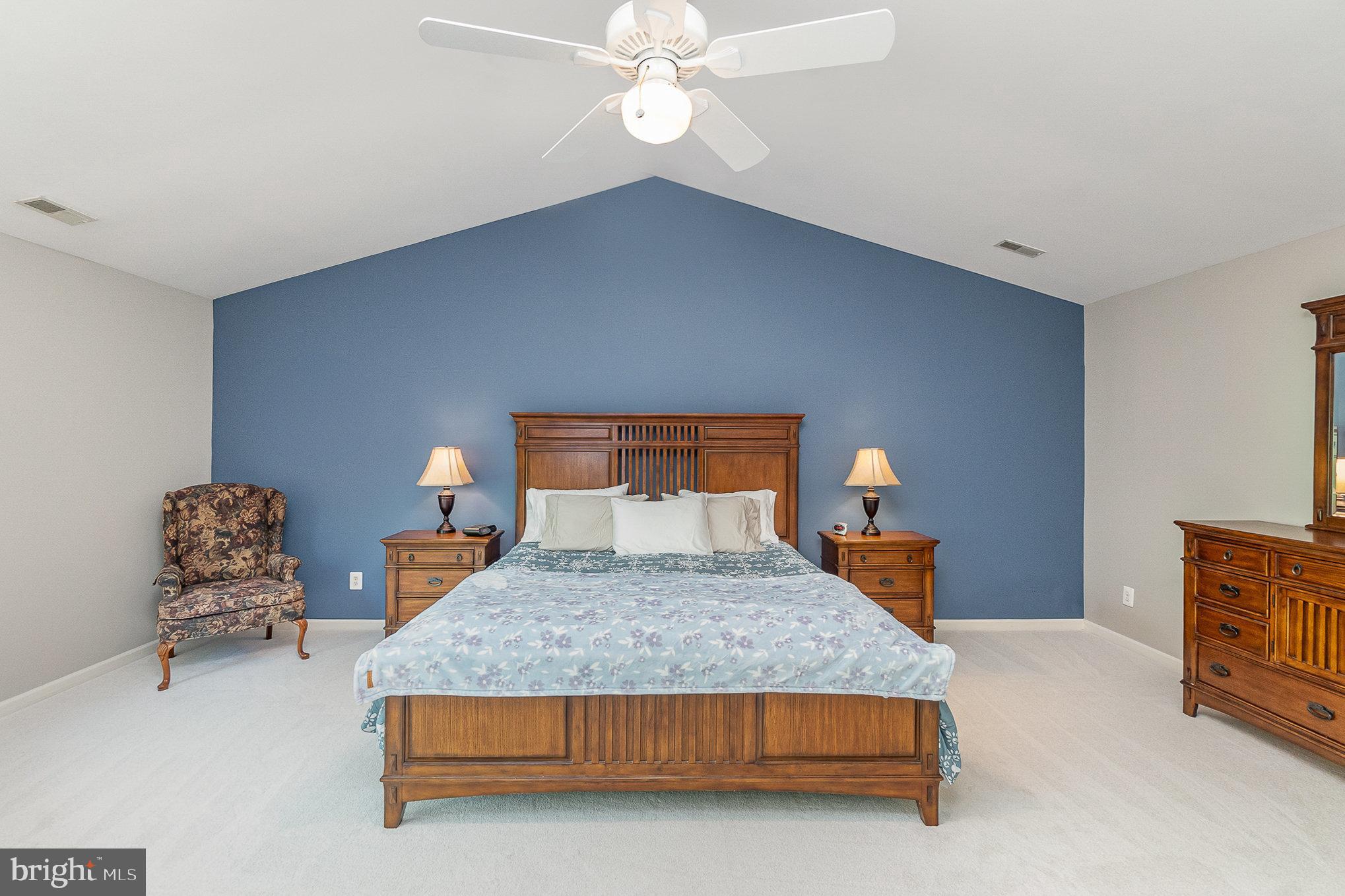 1326 Eagle Ridge Run Bel Air, MD 21014 - Photo 28 of 79 a bedroom with a bed and a chandelier