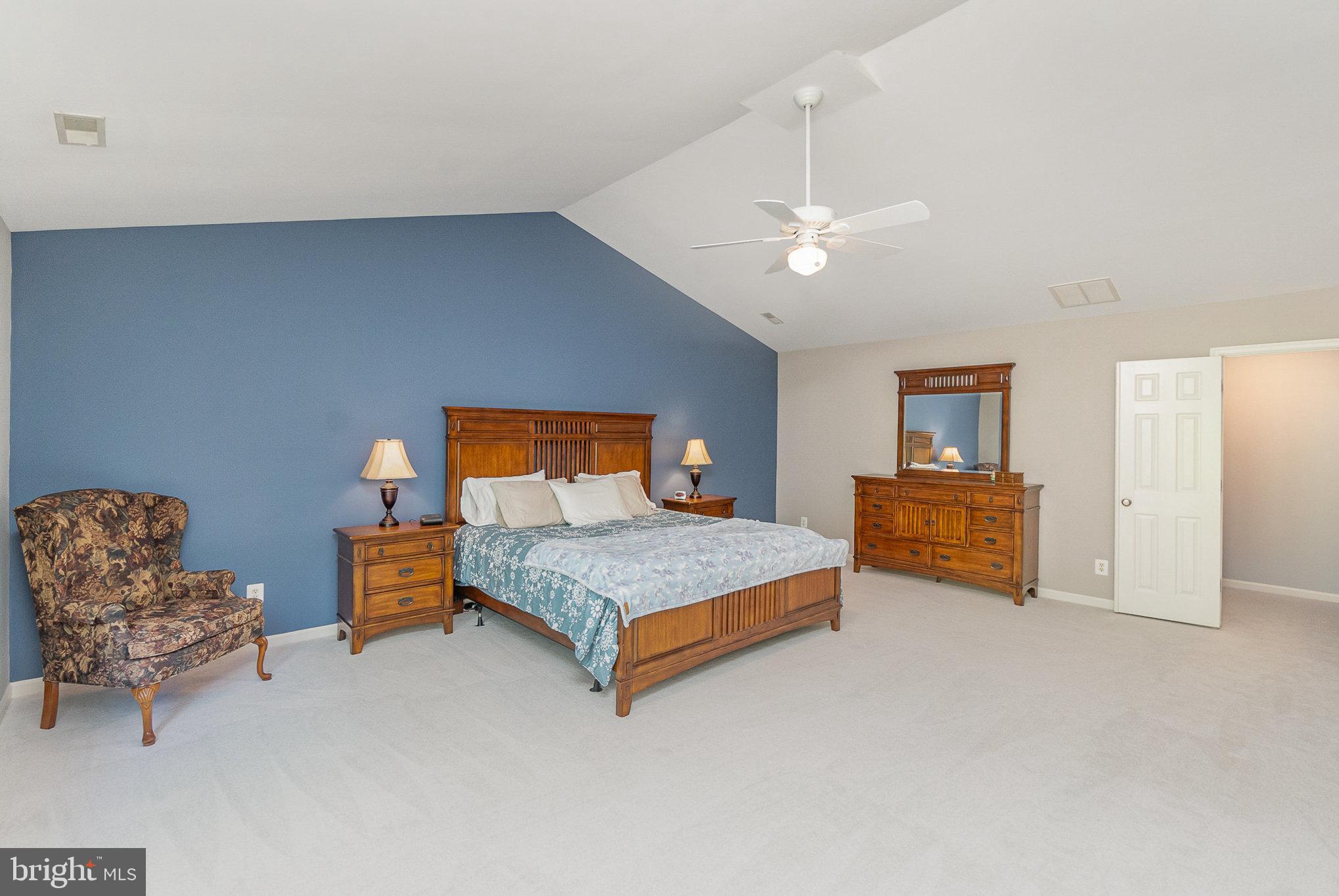 1326 Eagle Ridge Run Bel Air, MD 21014 - Photo 29 of 79 a bedroom with furniture and a chandelier