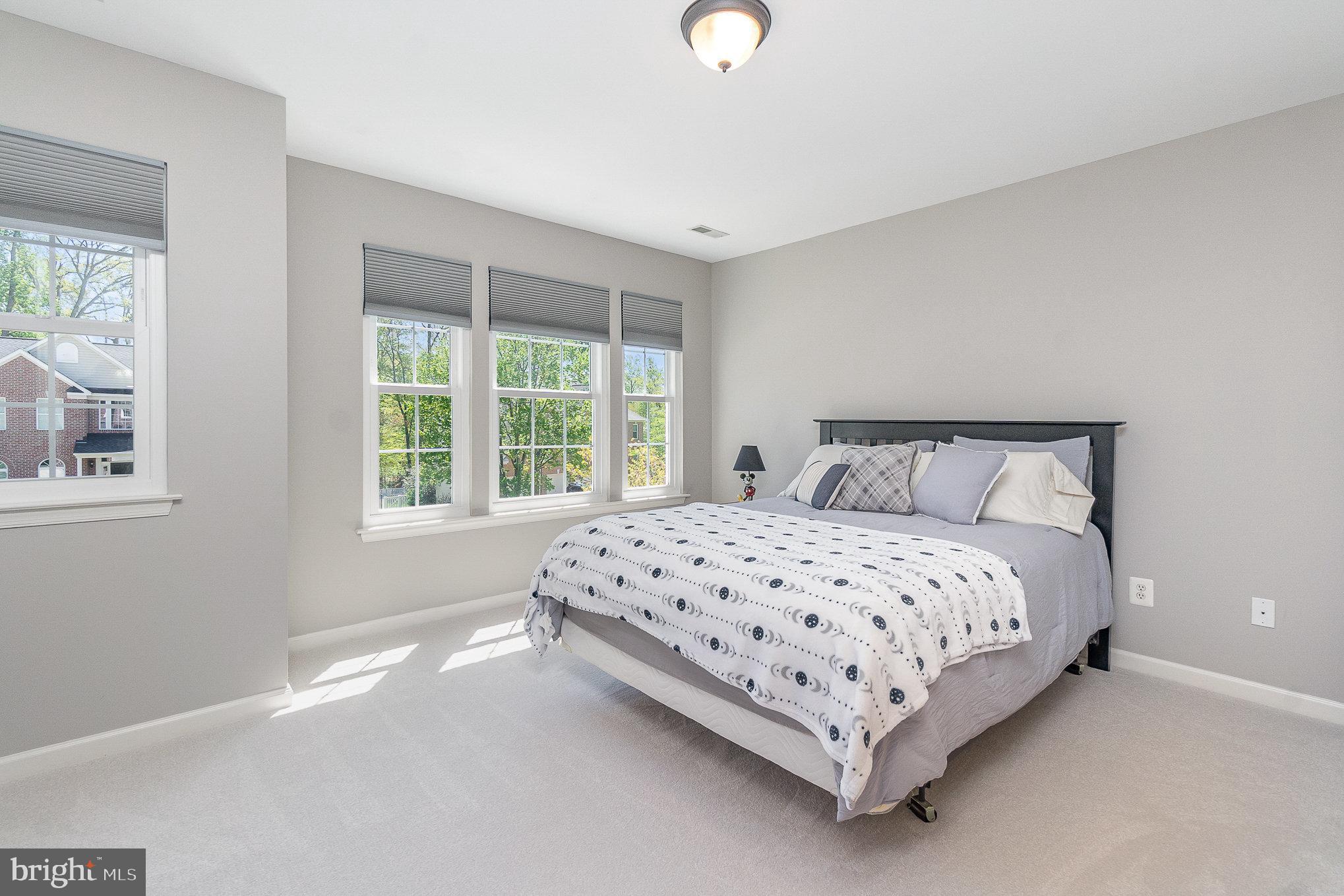 1326 Eagle Ridge Run Bel Air, MD 21014 - Photo 38 of 79 a large bed sitting in a bedroom next to a window