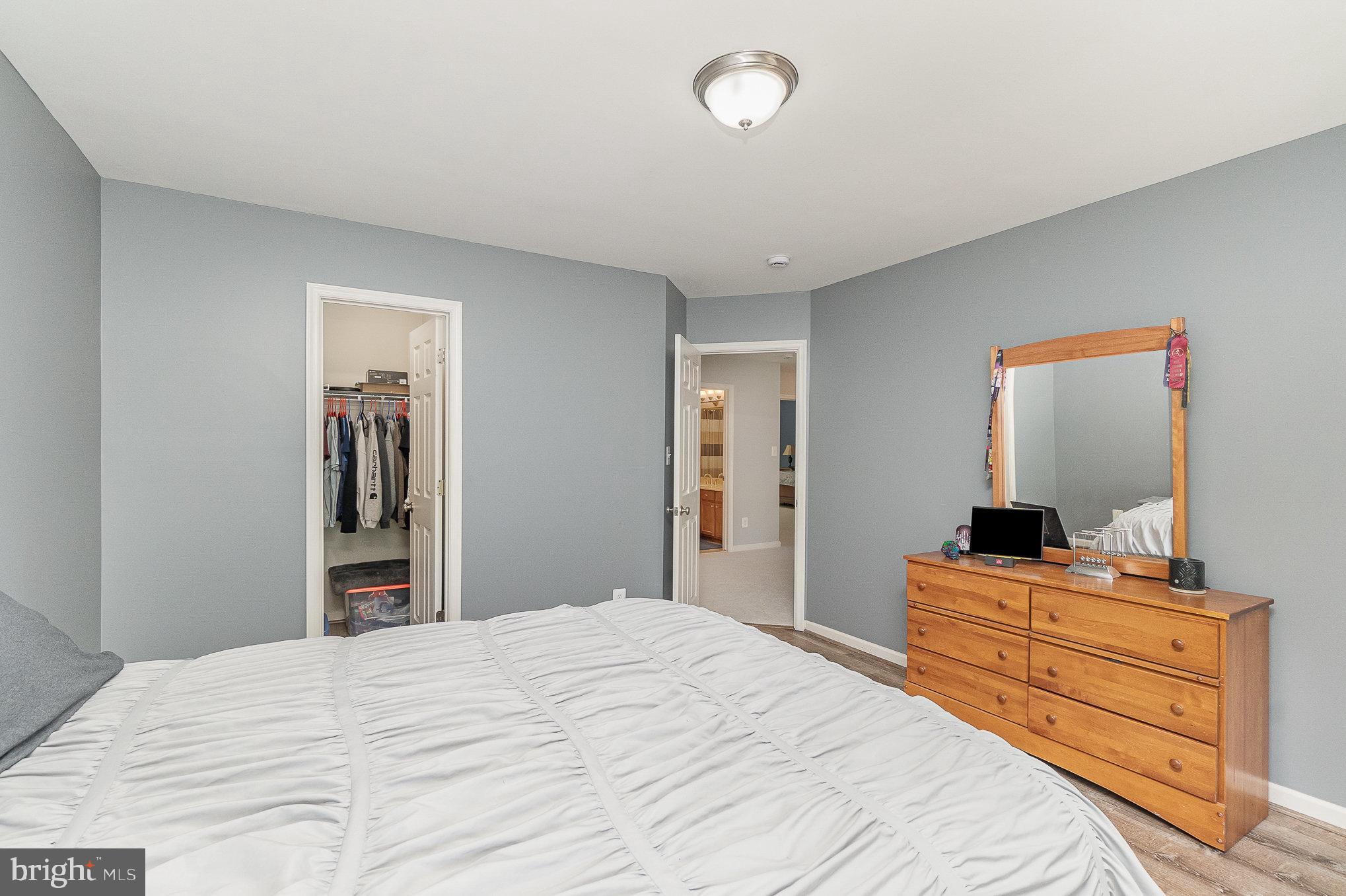 1326 Eagle Ridge Run Bel Air, MD 21014 - Photo 42 of 79 a bedroom with a bed and a flat screen tv