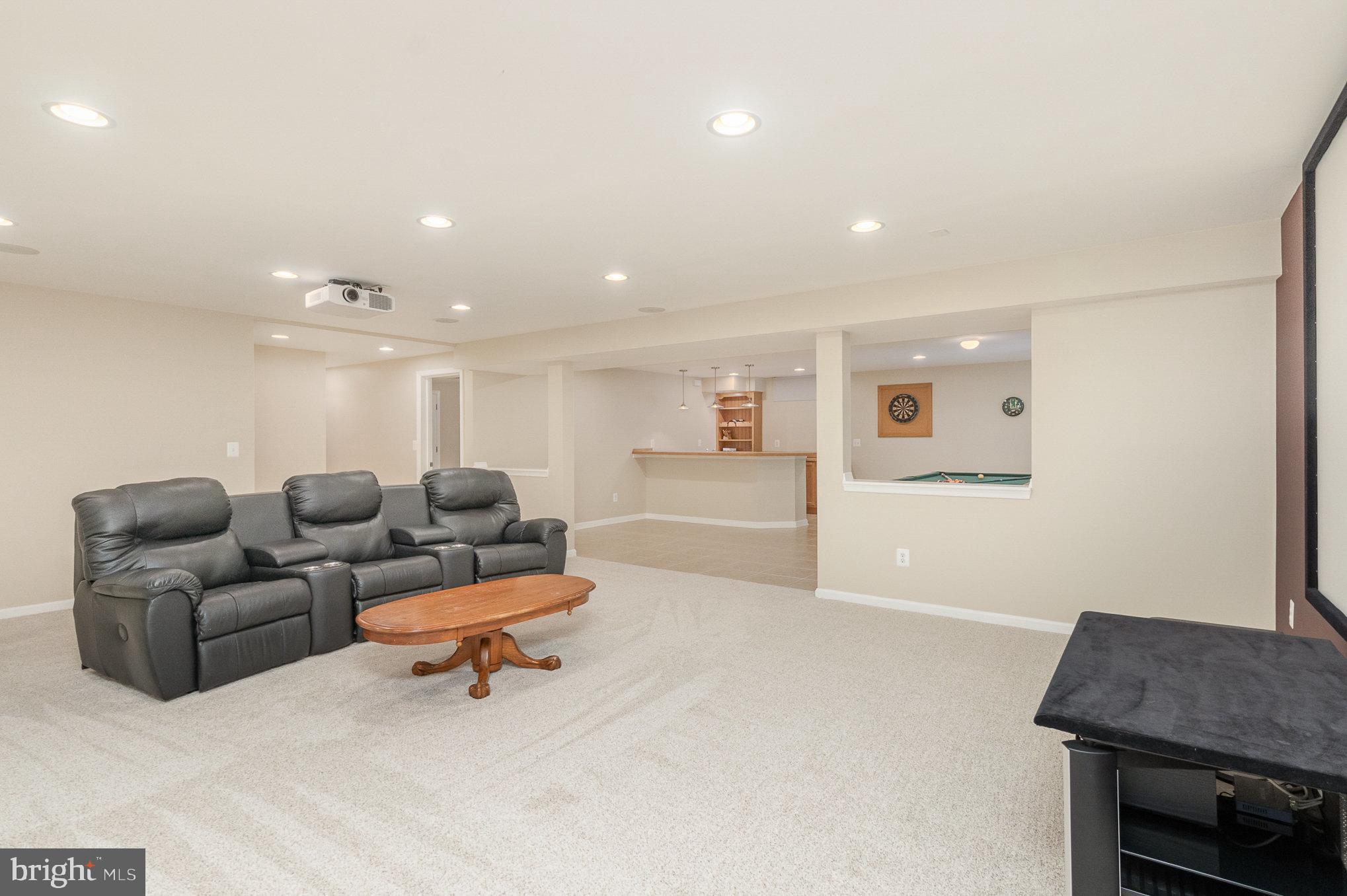 1326 Eagle Ridge Run Bel Air, MD 21014 - Photo 49 of 79 a living room with furniture and a flat screen tv