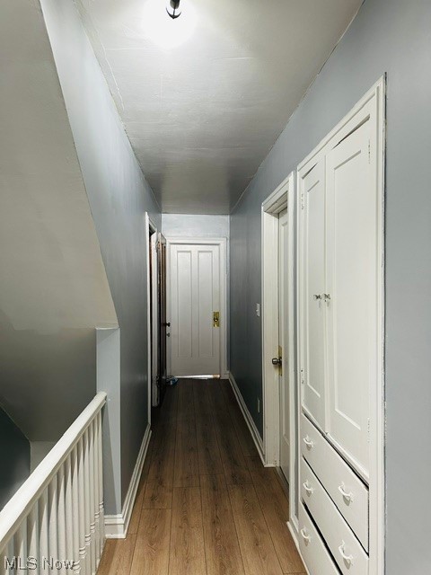 Hallway featuring hardwood / wood-style flooring