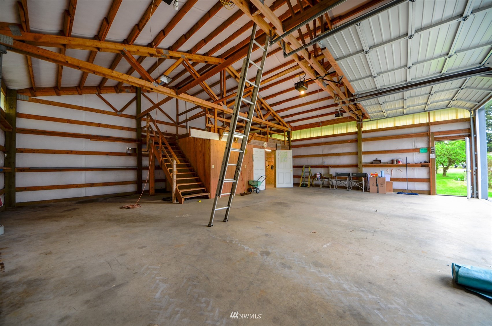 8735 178th Avenue Southwest Rochester, WA 98579 - Photo 19 of 26 a view of an empty room with a fireplace