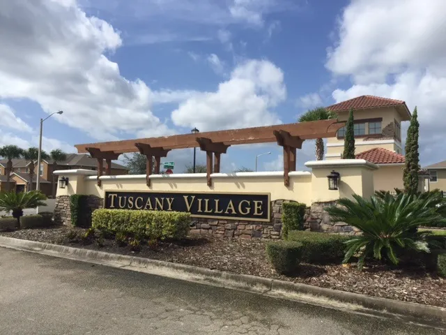 a street sign on a pole on a street