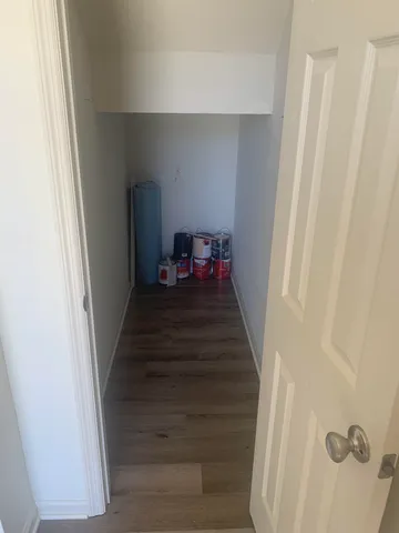 a view of a hallway view with staircase