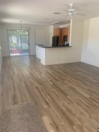 a view of a kitchen with a sink and a microwave