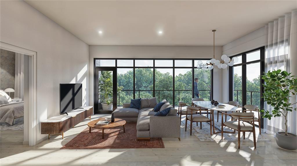 3101 Old Archer Road, Unit 606 Gainesville, FL 32608 - Photo 3 of 9 a living room with furniture tv and a large window
