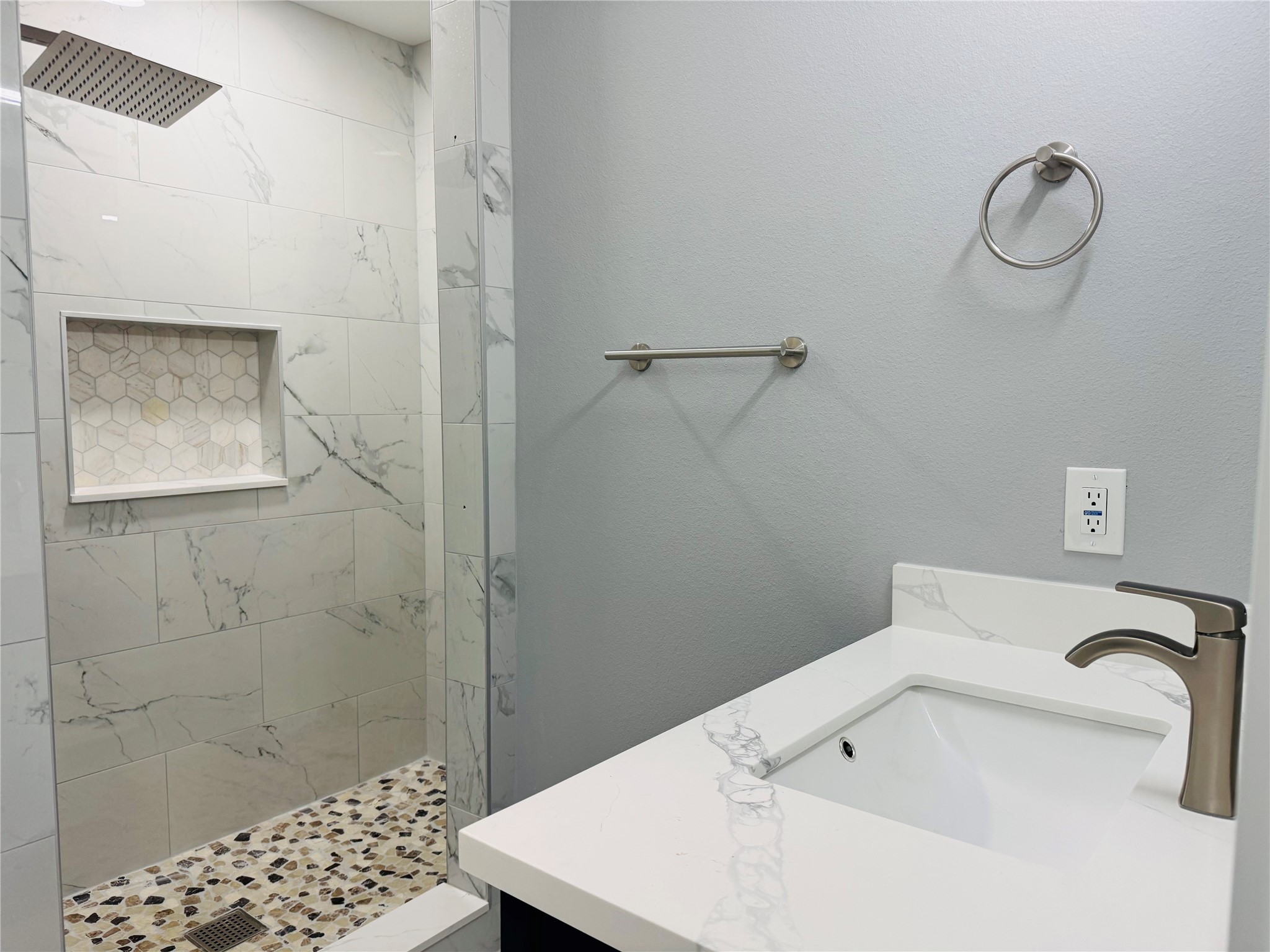 10934 Lilleux Road Houston, TX 77067 - Photo 22 of 27 a bathroom with a sink and a shower