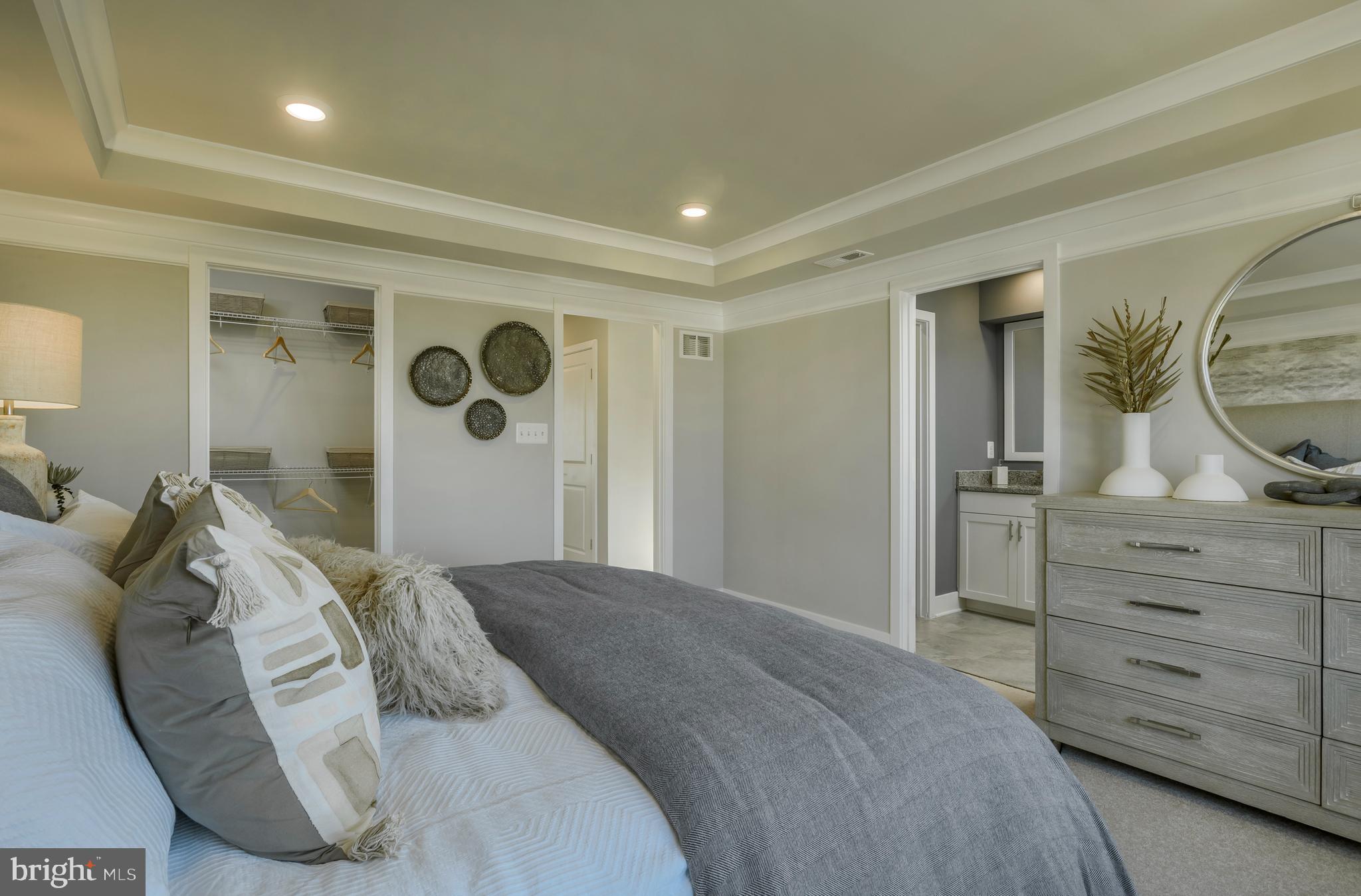 1841 Ritter Road Windsor Mill, MD 21244 - Photo 13 of 17 a bedroom with a bed and a dresser