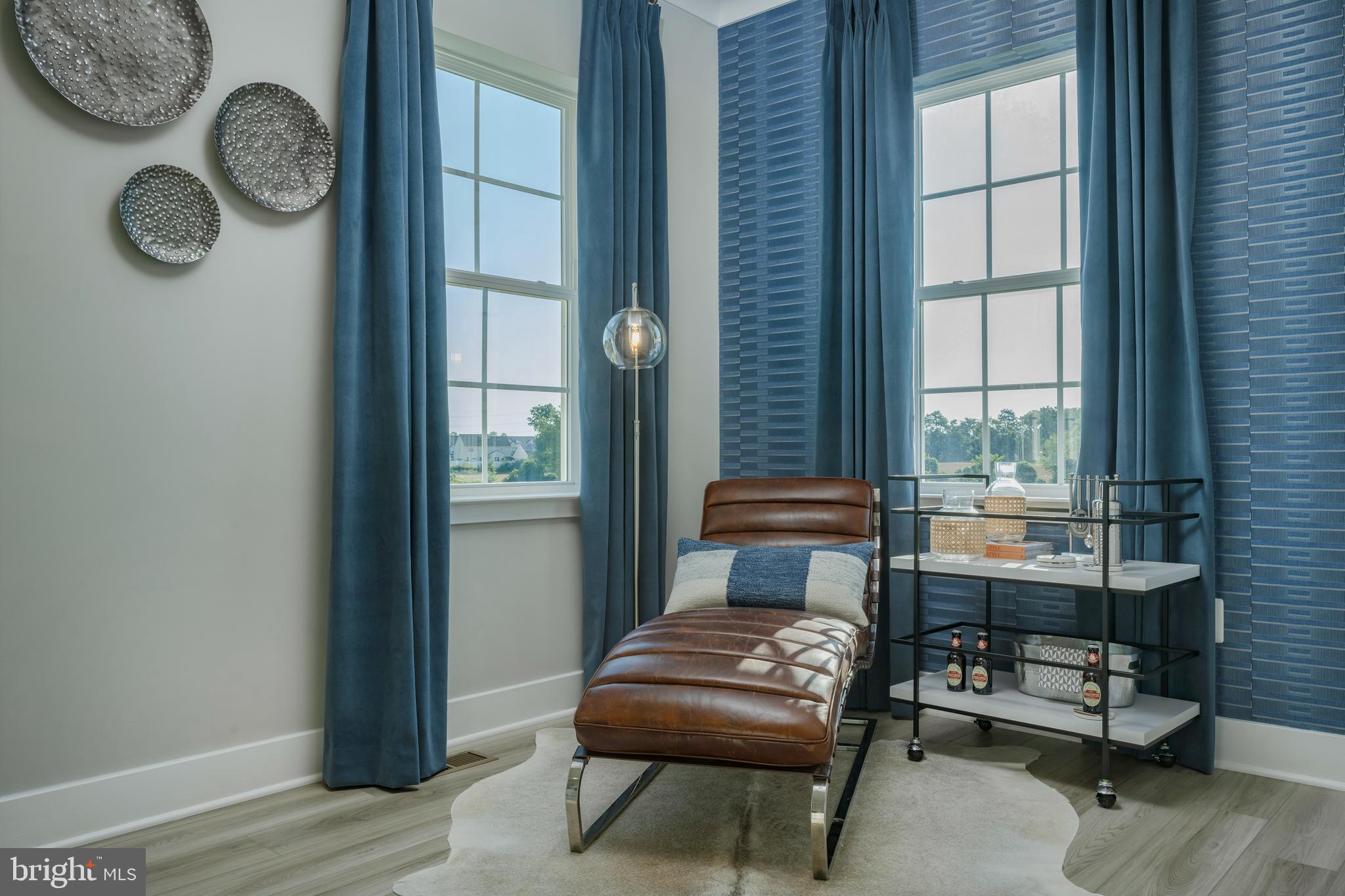 1841 Ritter Road Windsor Mill, MD 21244 - Photo 8 of 17 a living room with furniture and a window