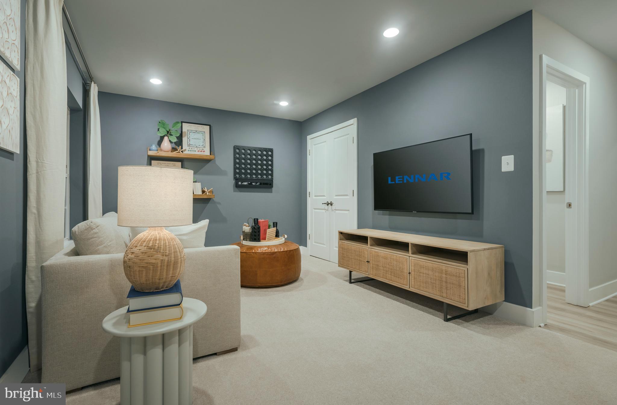 1841 Ritter Road Windsor Mill, MD 21244 - Photo 10 of 17 a living room with furniture and a flat screen tv