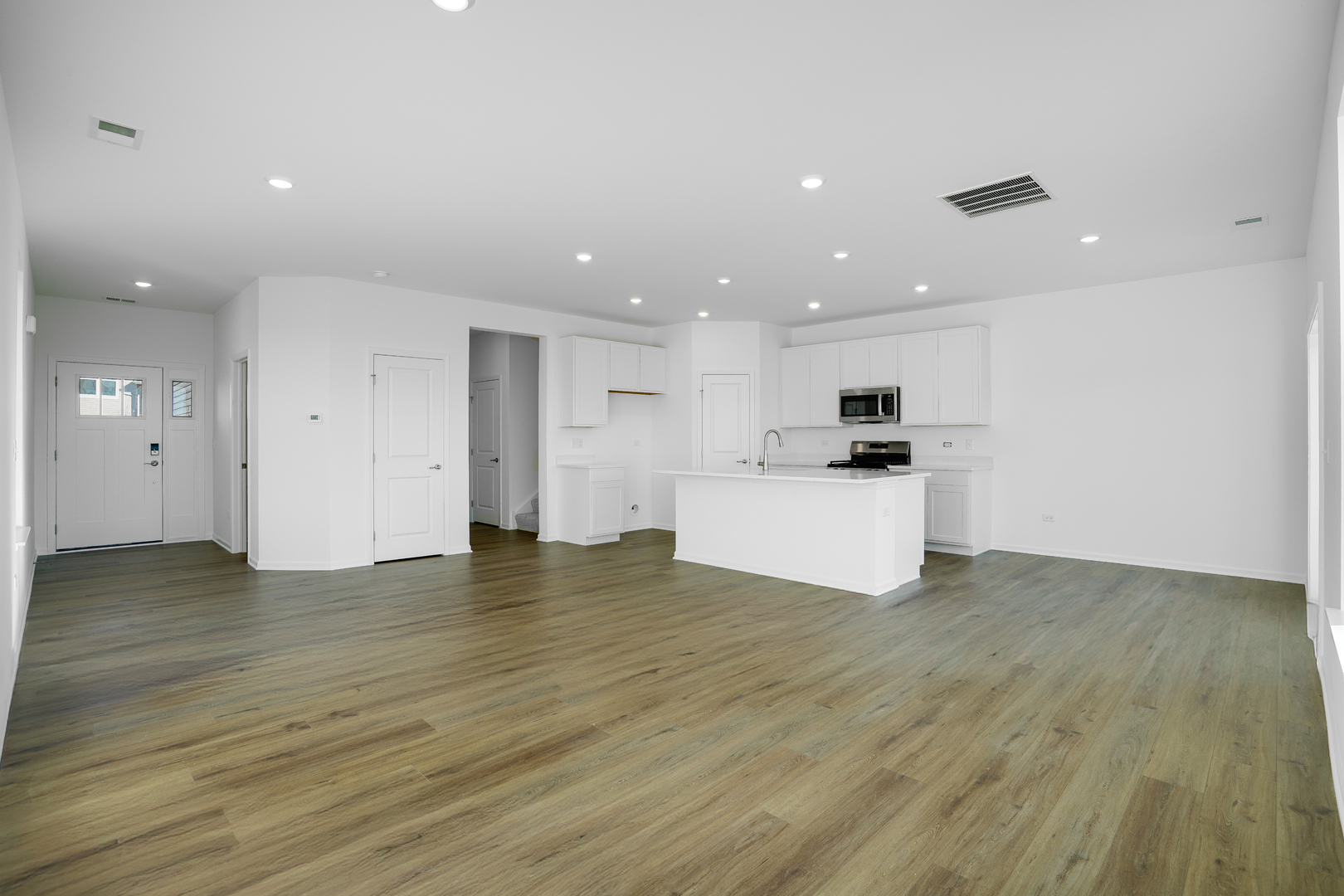 359 Red Oak Circle Volo, IL 60020 - Photo 4 of 18 a view of a kitchen with a sink and a refrigerator