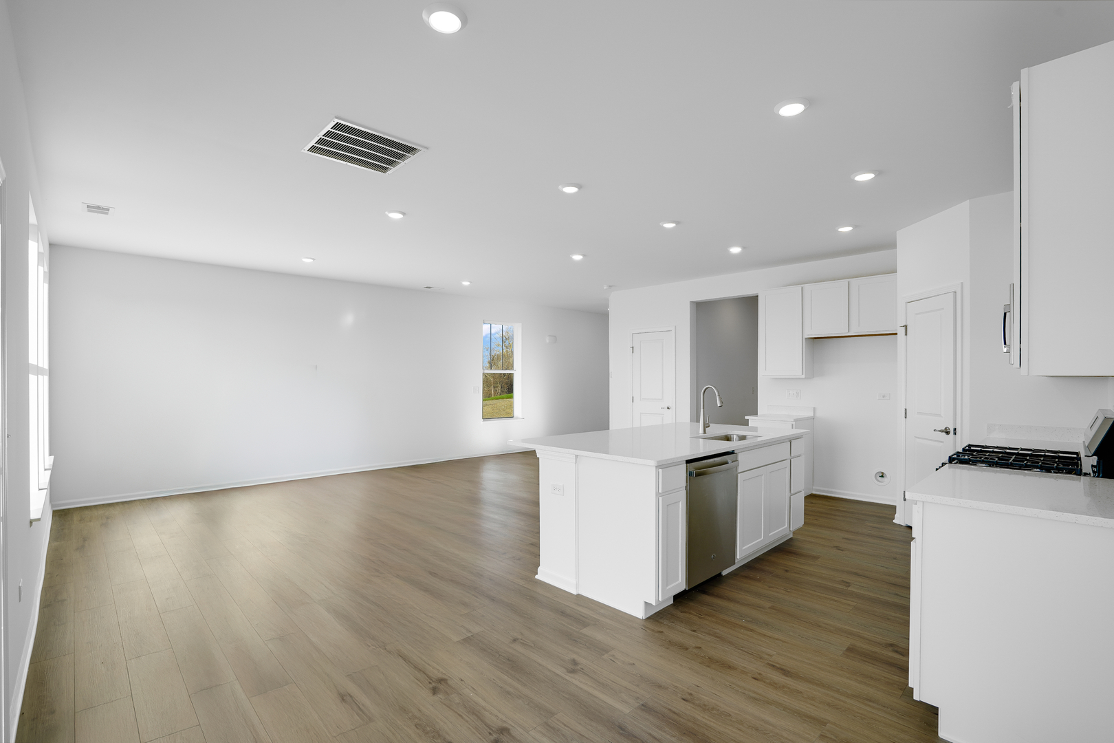 359 Red Oak Circle Volo, IL 60020 - Photo 8 of 18 a kitchen with stainless steel appliances a stove top oven and a refrigerator