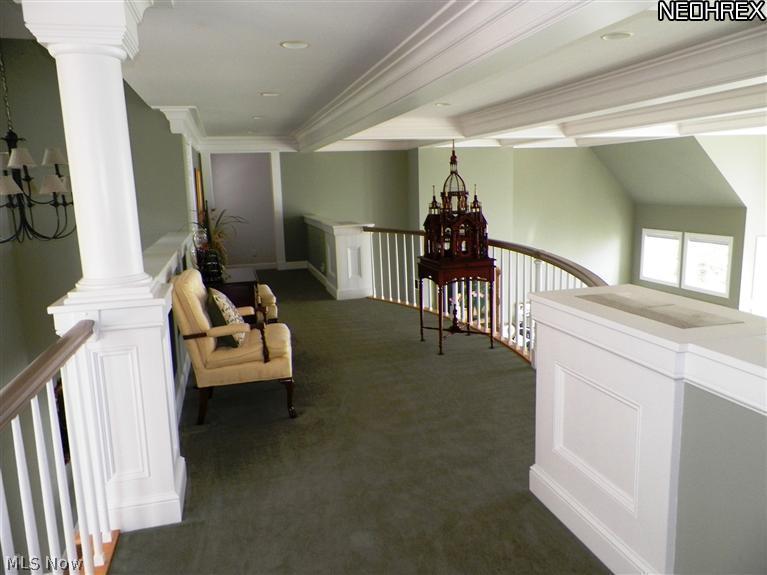 2730 North Bluff Ridge Drive Port Clinton, OH 43452 - Photo 24 of 25 The third level Loft overlooks the Living and Dining Room.