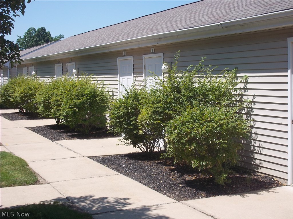 28340 Center Ridge Road, Unit 126 Westlake, OH 44145 - Photo 7 of 13 Each garage has own man door.