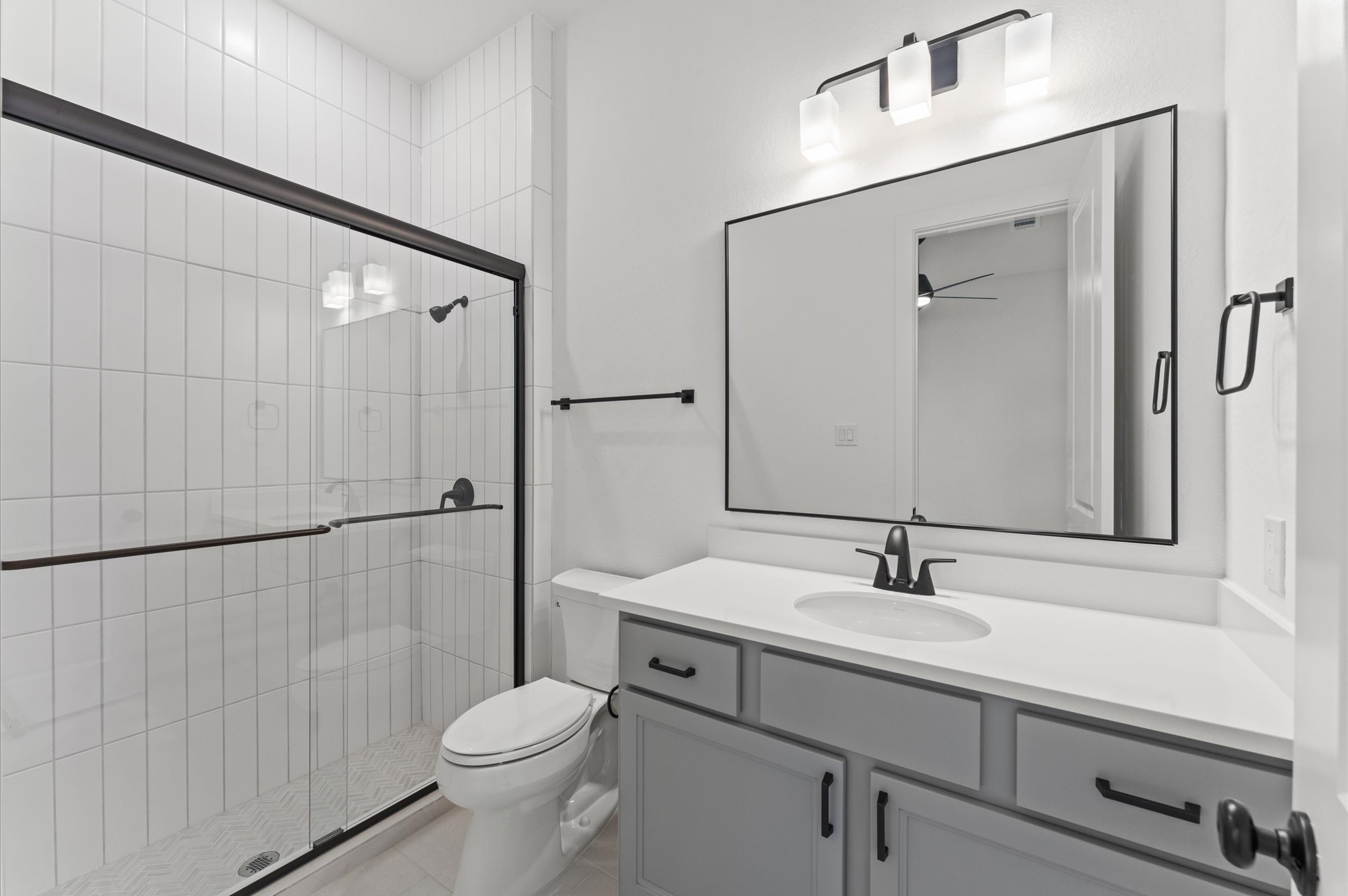 8218 Sherman Pk Trail Spring, TX 77389 - Photo 19 of 28 a bathroom with a sink toilet and shower