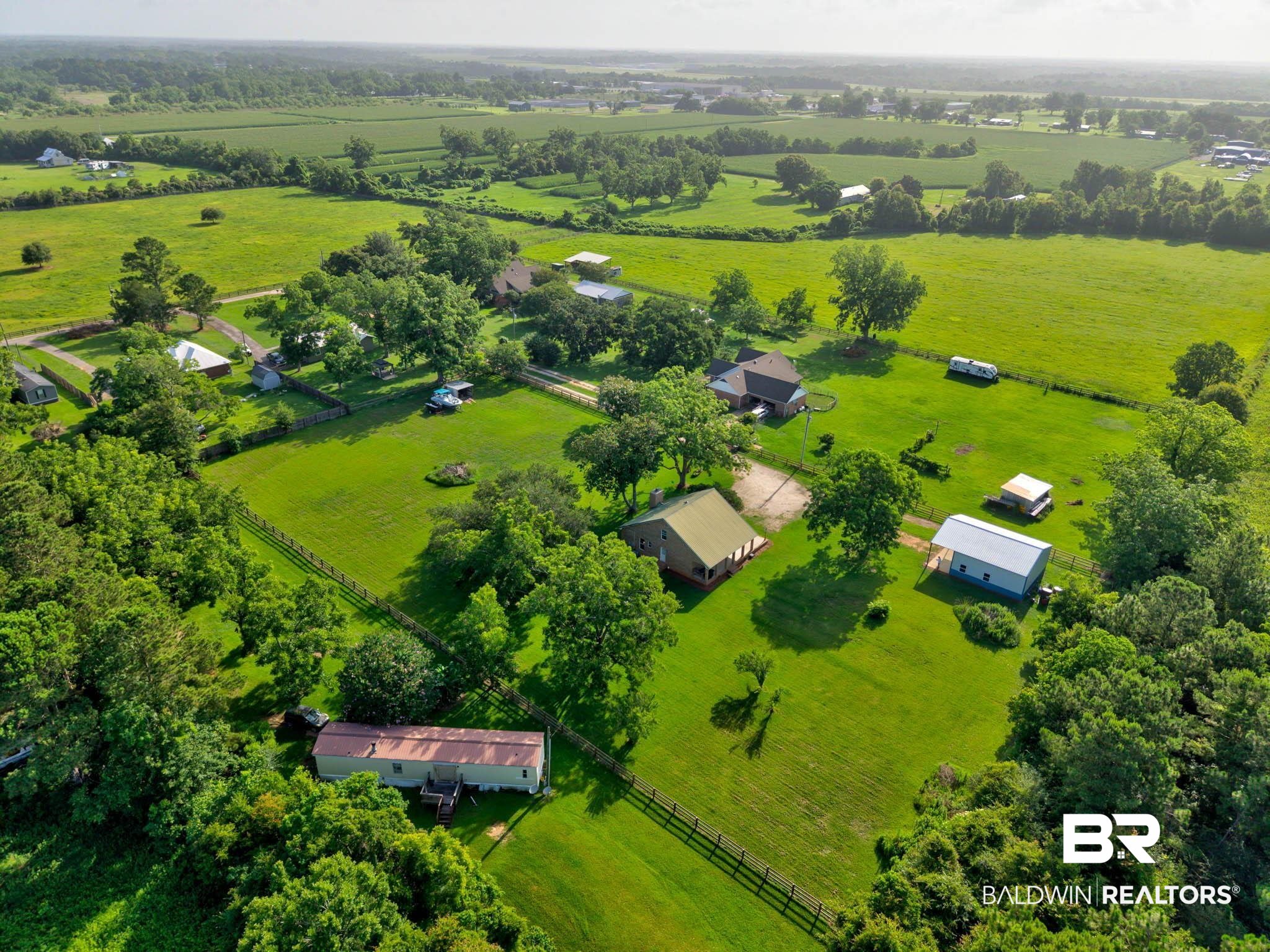 7564 Rabbit Run Road Fairhope, AL 36532 - Photo 88 of 88 Aerial view of sparsely populated area featuring agricultural land