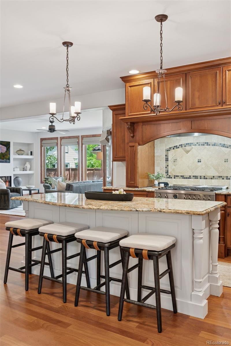 1026 South Cook Street Denver, CO 80209 - Photo 13 of 44 a kitchen with a table and chairs in it