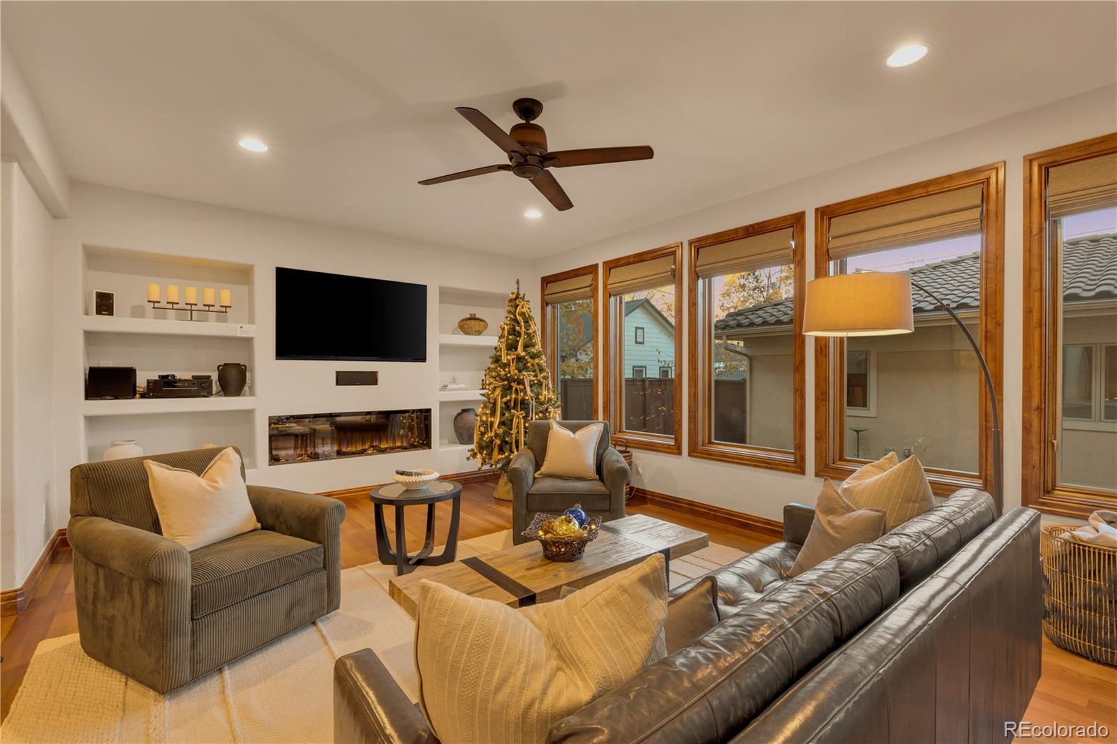 1026 South Cook Street Denver, CO 80209 - Photo 15 of 44 a living room with furniture and a flat screen tv