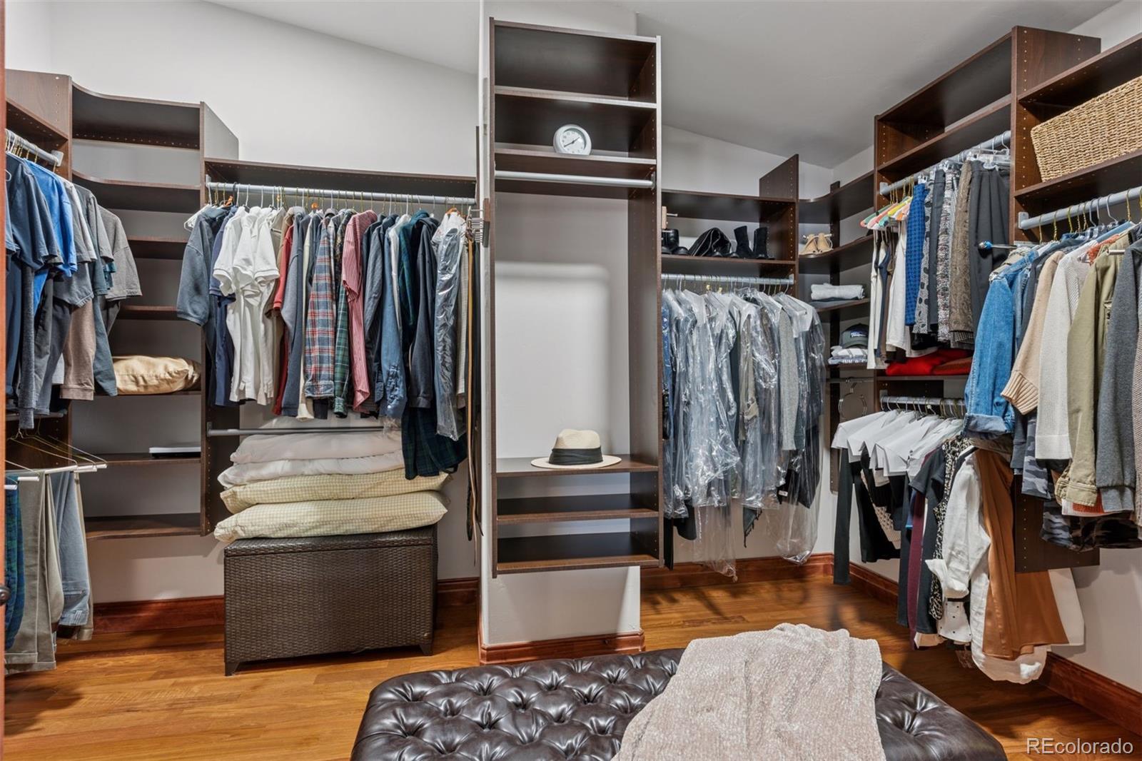 1026 South Cook Street Denver, CO 80209 - Photo 24 of 44 a view of walk in closet with clothes and shoes