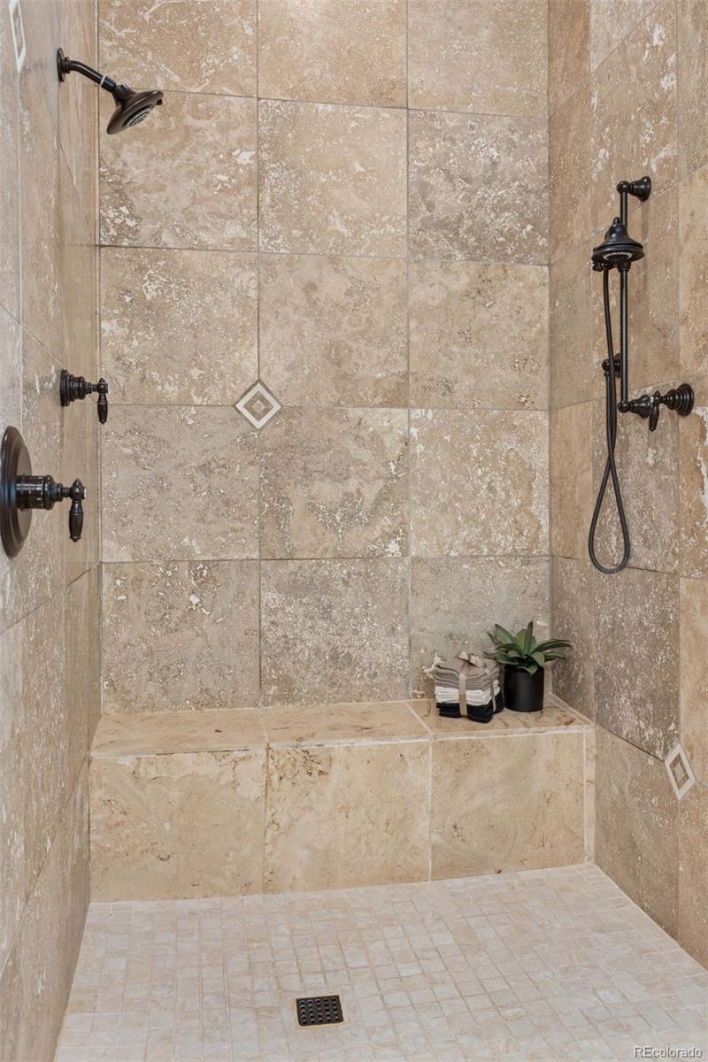 1026 South Cook Street Denver, CO 80209 - Photo 27 of 44 a bathroom with a shower