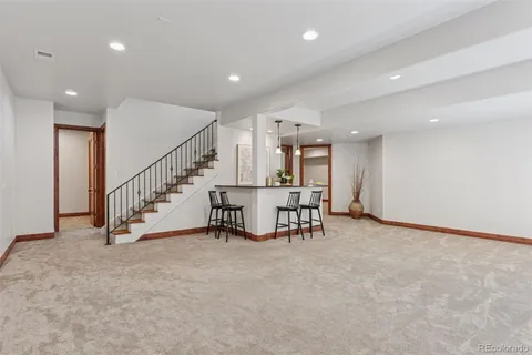 a view of living room filled with furniture and window