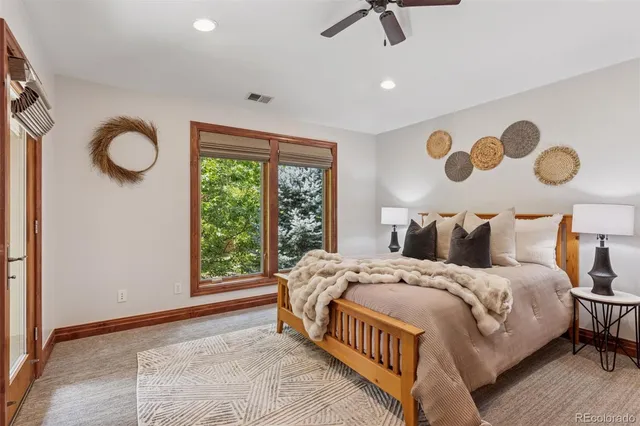 a bathroom with a granite countertop toilet a sink and bathtub