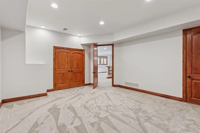 a view of a workspace with furniture