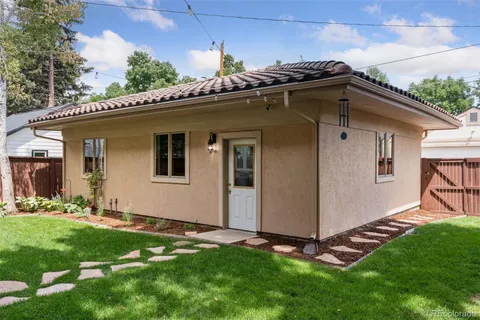 an aerial view of a house with a garden