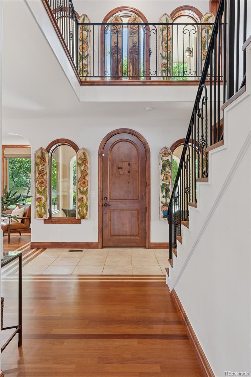 1026 South Cook Street Denver, CO 80209 - Photo 6 of 44 a view of an entryway with staircase