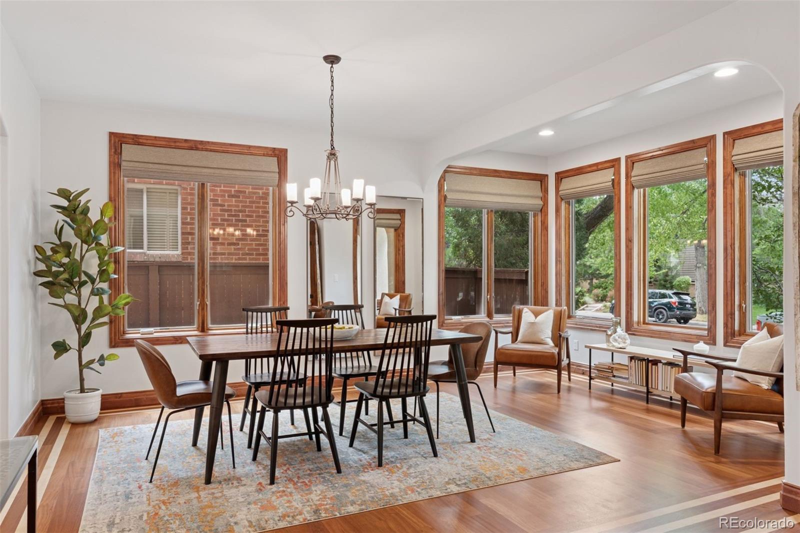 1026 South Cook Street Denver, CO 80209 - Photo 7 of 39 a view of a dining room with furniture window and outside view