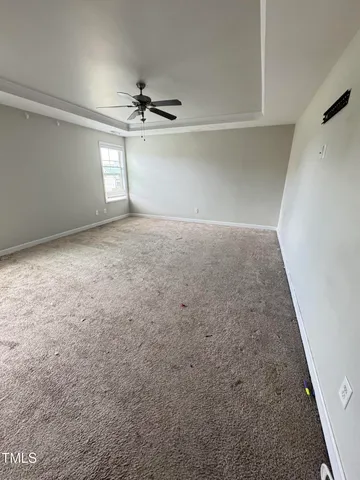 a spacious bathroom with a sink vanity and mirror