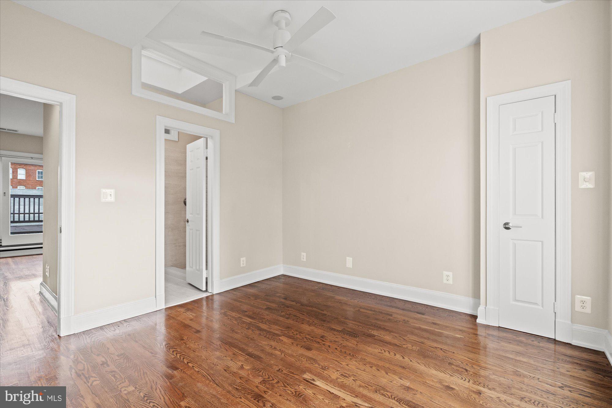 1209 S Street Northwest Washington, DC 20009 - Photo 31 of 64 wooden floor in an empty room