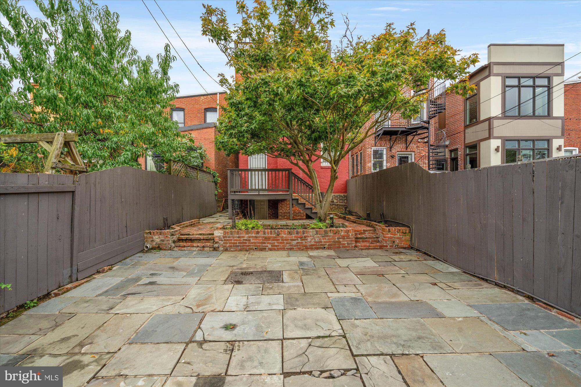 1209 S Street Northwest Washington, DC 20009 - Photo 42 of 64 a view of a house with a yard