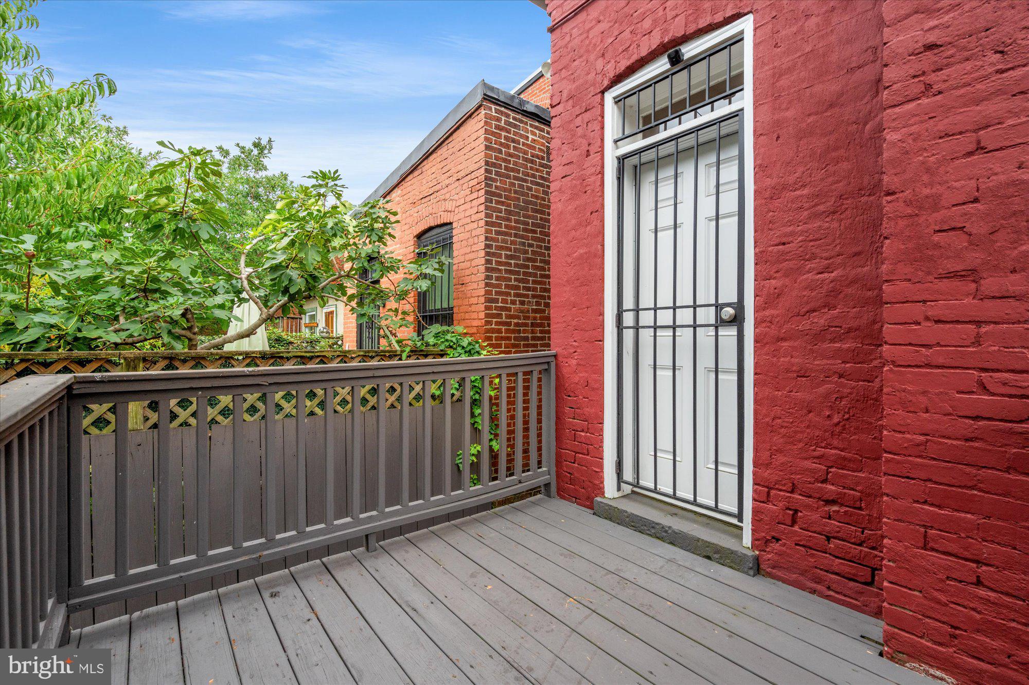 1209 S Street Northwest Washington, DC 20009 - Photo 43 of 64 a view of a wooden deck
