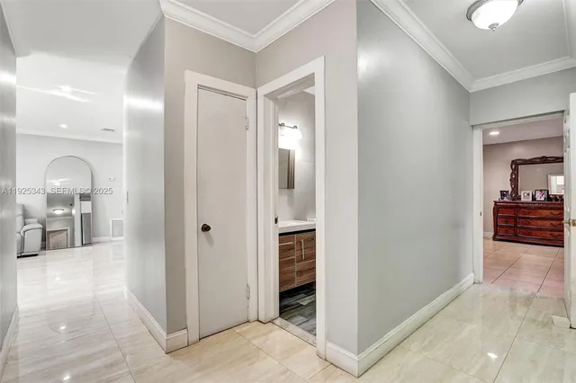 a view of a chairs and table in the balcony