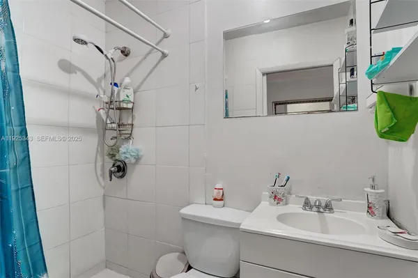 a bedroom with a bed and a closet