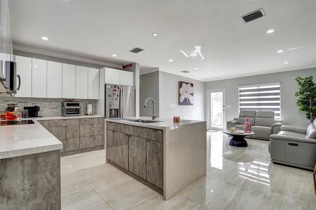 a bedroom with a bed and a dresser in it